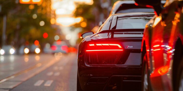 black Audi R8 parked beside road